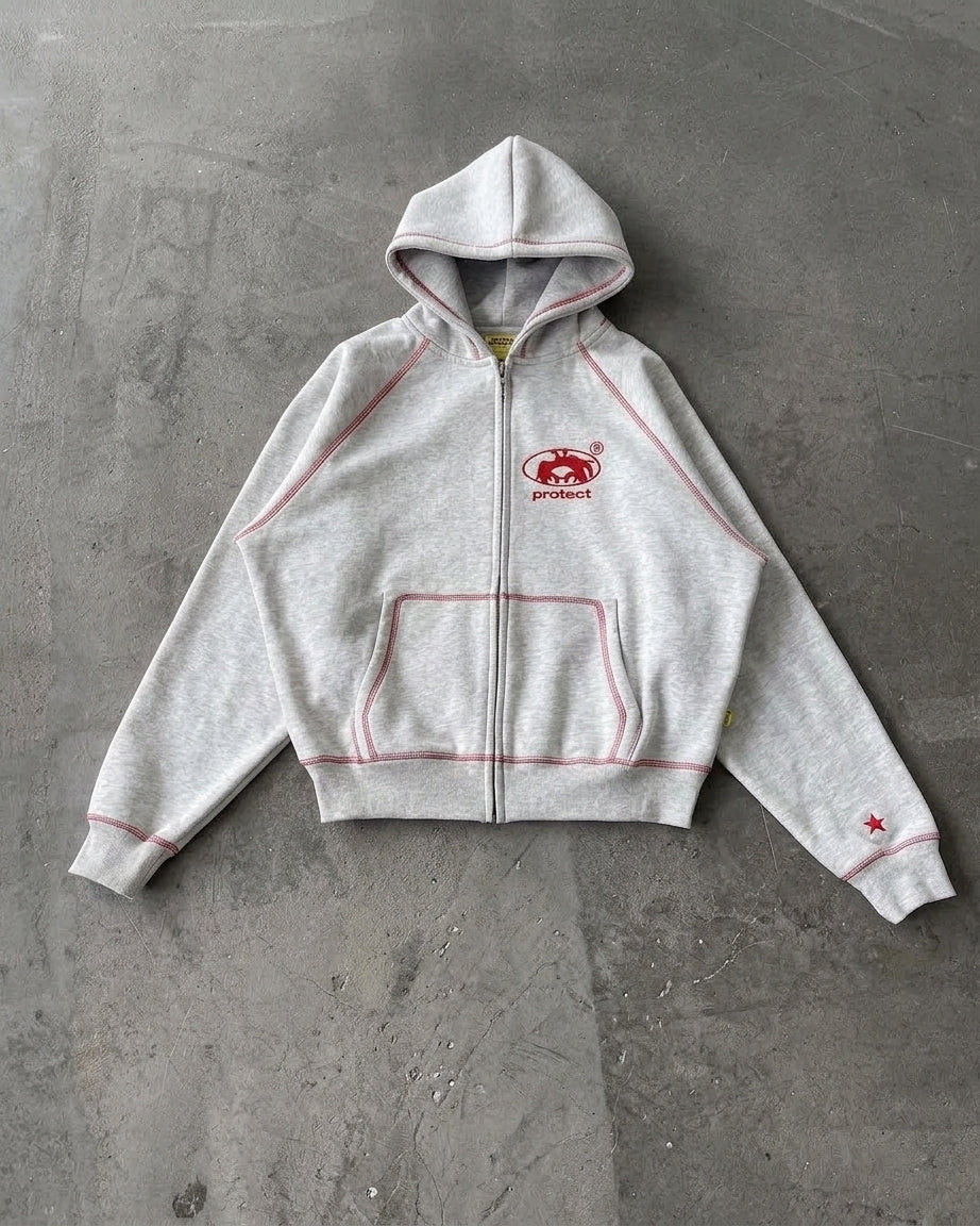VELO STUDIO Heavyweight Full-Zip Hoodie in Grau mit rotem Protect-Print und Sternstickerei am Ärmel